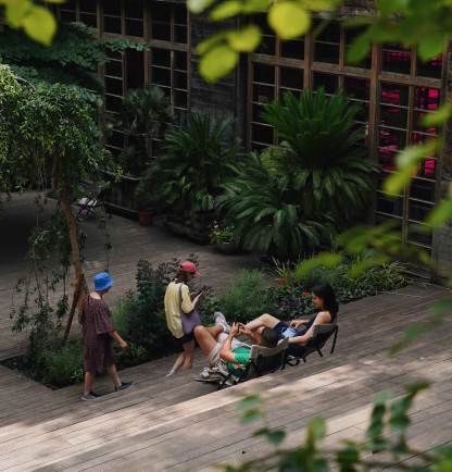 people chilling at aphitheatre in stamba hotel at summer