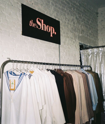 minimalist clothing rack inside the shop at stamba hotel